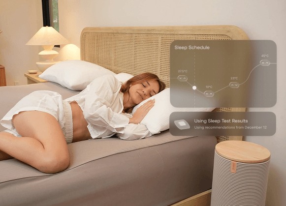 Woman sleeping next to an Orion column with the on-screen sleep schedule and test recommendations.